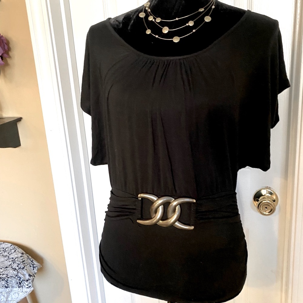 Black scoop neck top with faux gold belt.